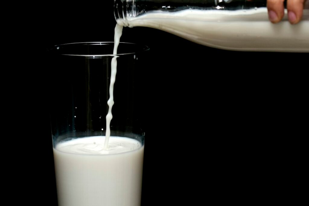 Milk being poured into a glass
