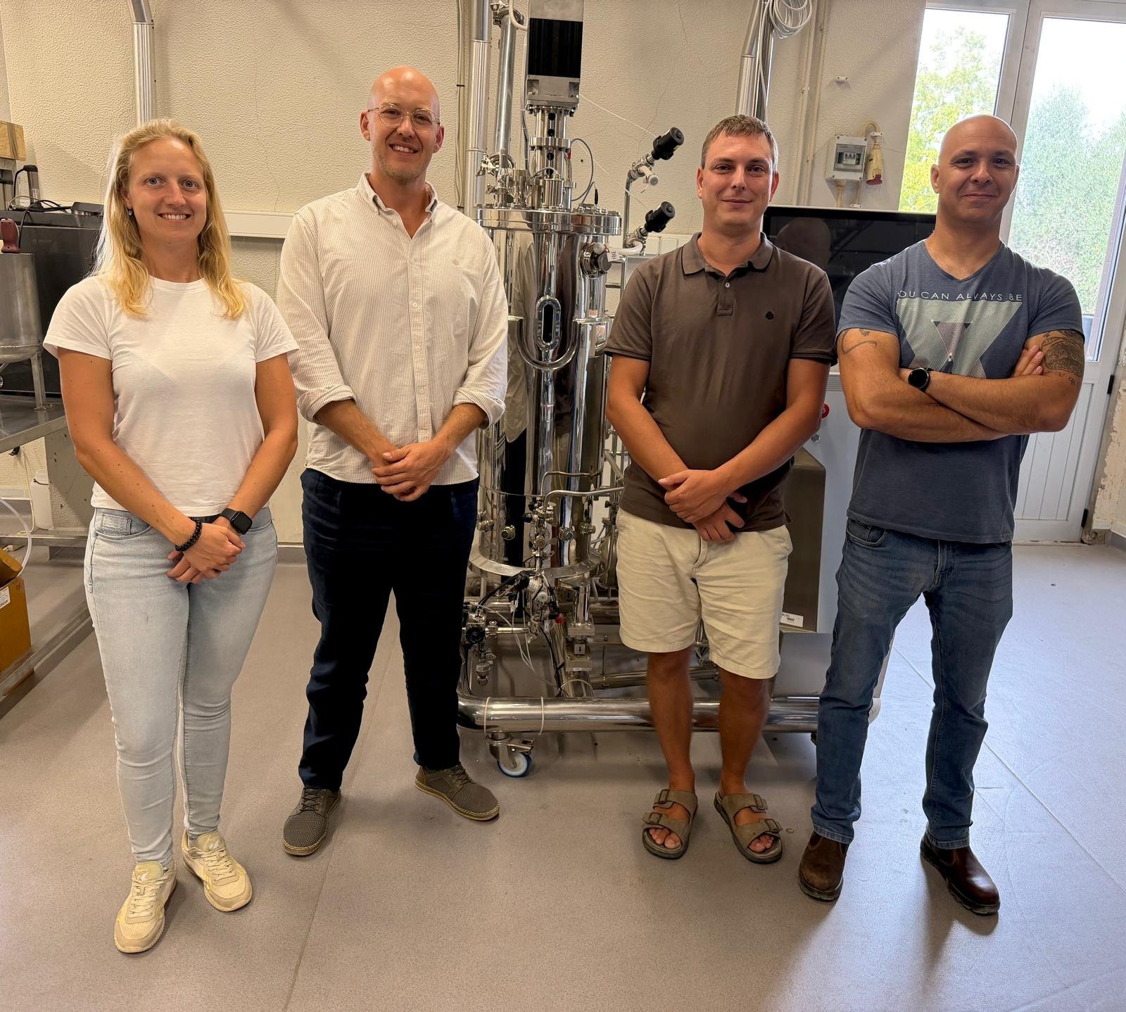 The PhycoFerm team in the fermentation laboratory in Faro: Peter Schulze, Benjamin Schmid, Amikam Bargil and Lisa Schüler, beside the pilot-scale fermenter.